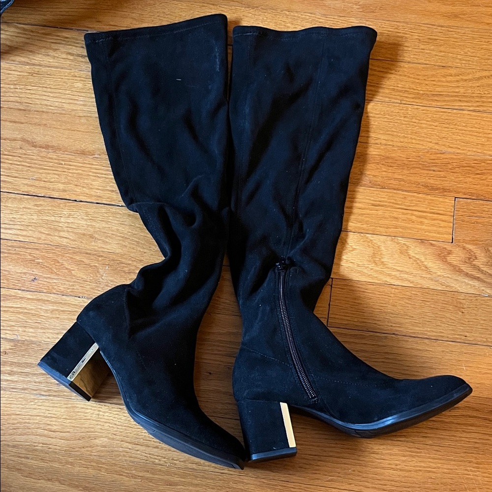 Black faux suede over the knee boots.